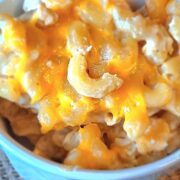 Close up of the finished Dump & Bake Low Sodium Macaroni and Cheese in a white ramekin.