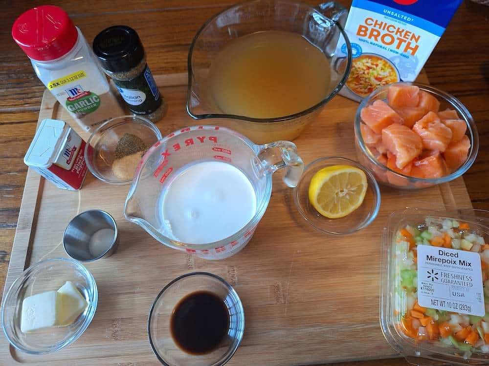 A flatlay of all the ingredients needed to make the salmon stew recipe